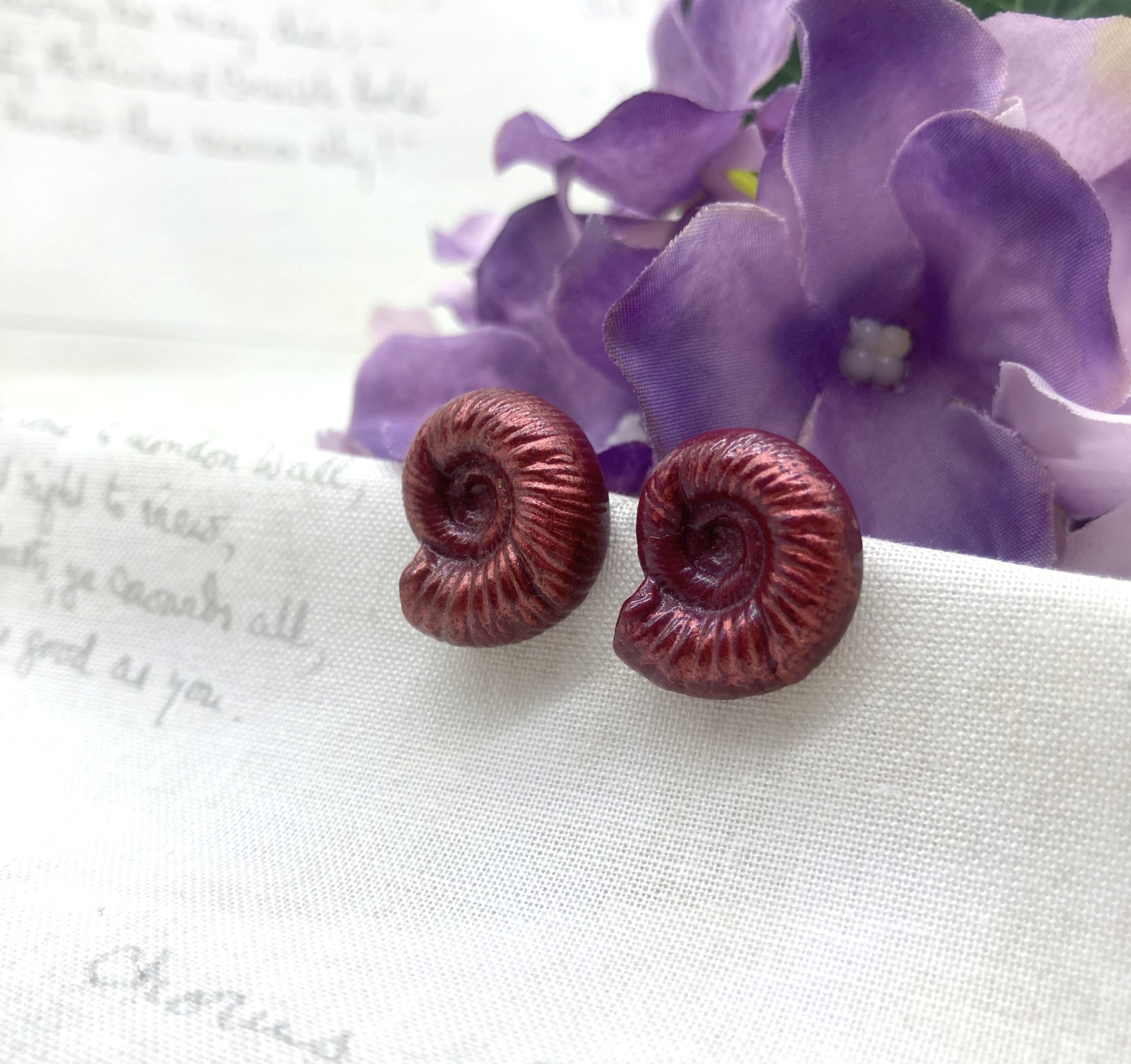 ammonite red stud earrings by Bowerbird Jewellery